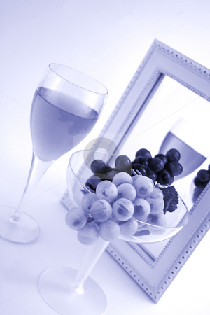 To use this stock image in your creative project, please select the size you need over to the right and click the "Add to Cart" button.
Your downloaded image will come with the Cutcaster watermark removed so don’t worry about the watermark you see on this page. Isolated Grapes In a Glass stock photo, Isolated Grapes In a Glass in front of a Mirror with a Glass of Wine by Mehmet Dilsiz