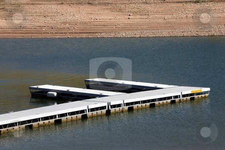 To use this stock image in your creative project, please select the size you need over to the right and click the "Add to Cart" button.
Your downloaded image will come with the Cutcaster watermark removed so don’t worry about the watermark you see on this page. Boat Marina stock photo, Marina in the Eat Canyon by Mehmet Dilsiz