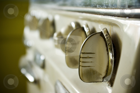 To use this stock image in your creative project, please select the size you need over to the right and click the "Add to Cart" button.
Your downloaded image will come with the Cutcaster watermark removed so don’t worry about the watermark you see on this page. Vintage Oven 1 stock photo, Temperature knobs on an oven made in the 1950s. by Kristine Keller