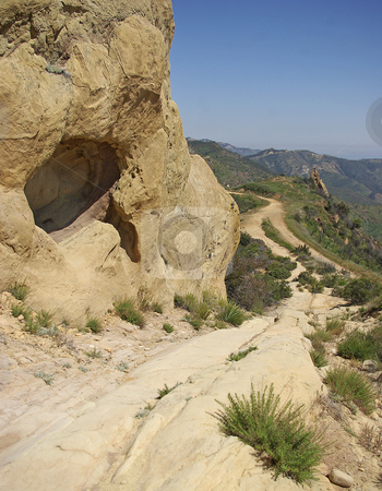 To use this stock image in your creative project, please select the size you need over to the right and click the "Add to Cart" button.
Your downloaded image will come with the Cutcaster watermark removed so don’t worry about the watermark you see on this page. Rock Formations By A Trail stock photo, by Kristine Keller