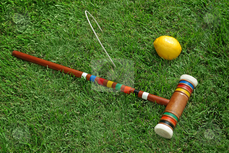 To use this stock image in your creative project, please select the size you need over to the right and click the "Add to Cart" button.
Your downloaded image will come with the Cutcaster watermark removed so don’t worry about the watermark you see on this page. Fruit Croquet 4 stock photo, A fruit-themed game of croquet. by Kristine Keller