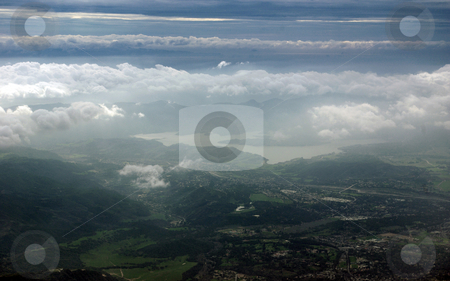 To use this stock image in your creative project, please select the size you need over to the right and click the "Add to Cart" button.
Your downloaded image will come with the Cutcaster watermark removed so don’t worry about the watermark you see on this page. Matilija Lake stock photo, An aerial view of Matilija Lake in Ventura County, California in late winter. by Kristine Keller