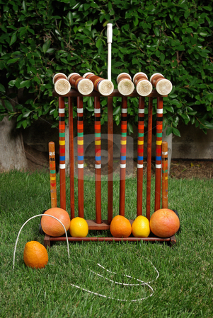 To use this stock image in your creative project, please select the size you need over to the right and click the "Add to Cart" button.
Your downloaded image will come with the Cutcaster watermark removed so don’t worry about the watermark you see on this page. Fruit Croquet 2 stock photo, A fruit-themed game of croquet. by Kristine Keller