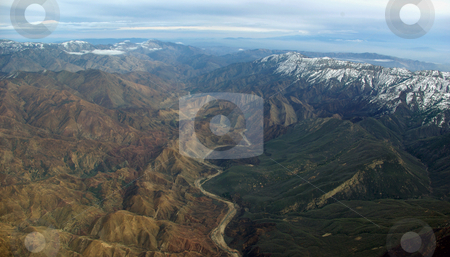 To use this stock image in your creative project, please select the size you need over to the right and click the "Add to Cart" button.
Your downloaded image will come with the Cutcaster watermark removed so don’t worry about the watermark you see on this page. Two Worlds stock photo, A well-difined boundary between desert and forest landscapes. by Kristine Keller