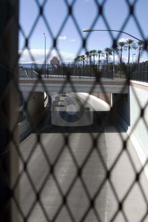To use this stock image in your creative project, please select the size you need over to the right and click the "Add to Cart" button.
Your downloaded image will come with the Cutcaster watermark removed so don’t worry about the watermark you see on this page. Highway Behind the Fences in Las Vegas stock photo, Highway Behind the Fences in Las Vegas -Road in focus by Mehmet Dilsiz