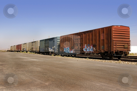 To use this stock image in your creative project, please select the size you need over to the right and click the "Add to Cart" button.
Your downloaded image will come with the Cutcaster watermark removed so don’t worry about the watermark you see on this page. Old Wagons with Graffiti stock photo, Old Wagon with Salt Pile and Clear Skies on the Background by Mehmet Dilsiz