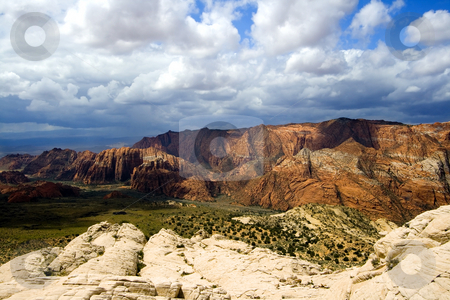 To use this stock image in your creative project, please select the size you need over to the right and click the "Add to Cart" button.
Your downloaded image will come with the Cutcaster watermark removed so don’t worry about the watermark you see on this page. Looking down the Sandstones in to Snow Canyon - Utah stock photo, Snow Canyon in St. George, Utah - Sandstones by Mehmet Dilsiz