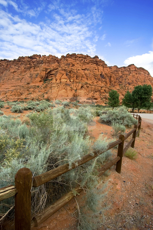 To use this stock image in your creative project, please select the size you need over to the right and click the "Add to Cart" button.
Your downloaded image will come with the Cutcaster watermark removed so don’t worry about the watermark you see on this page. Hiking Path in Snow Canyon with Rails in the Image - Utah stock photo, Hiking Path in Snow Canyon with Rails in the Image by Mehmet Dilsiz