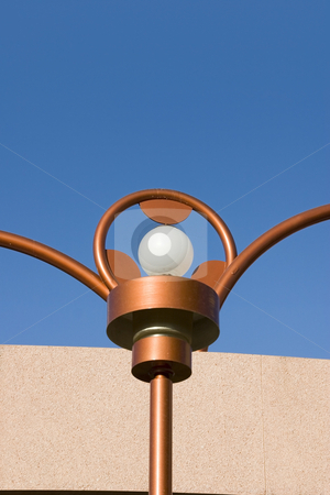 To use this stock image in your creative project, please select the size you need over to the right and click the "Add to Cart" button.
Your downloaded image will come with the Cutcaster watermark removed so don’t worry about the watermark you see on this page. Close up on a Unique Brass Lighting along the Bridge stock photo, Close up on a Unique Abstract Brass Lighting along the Bridge by Mehmet Dilsiz