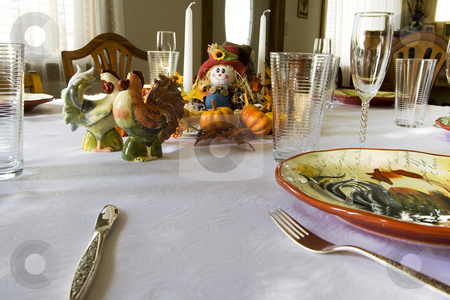 To use this stock image in your creative project, please select the size you need over to the right and click the "Add to Cart" button.
Your downloaded image will come with the Cutcaster watermark removed so don’t worry about the watermark you see on this page. Getting Ready for the Thanksgiving Family Dinner stock photo, Family Dinner Time by Mehmet Dilsiz