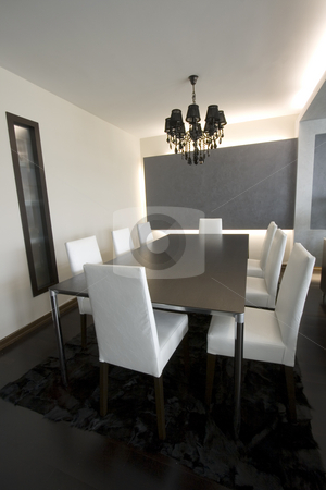 To use this stock image in your creative project, please select the size you need over to the right and click the "Add to Cart" button.
Your downloaded image will come with the Cutcaster watermark removed so don’t worry about the watermark you see on this page. Trendy Modern Dining Room stock photo, Trendy Modern Dining Room and Dinner Table by Mehmet Dilsiz