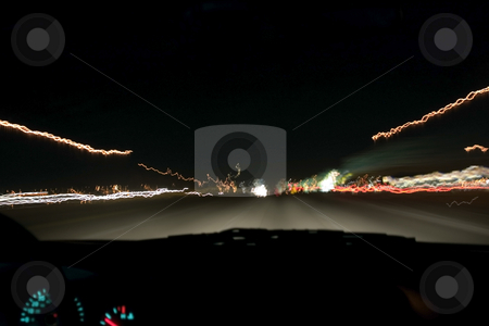 To use this stock image in your creative project, please select the size you need over to the right and click the "Add to Cart" button.
Your downloaded image will come with the Cutcaster watermark removed so don’t worry about the watermark you see on this page. Highway Traffic and Lights at Night stock photo, Shot of a higway and car lights taken from the car with a tripod while travelling. by Mehmet Dilsiz