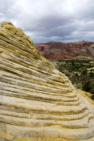 To use this stock image in your creative project, please select the size you need over to the right and click the "Add to Cart" button.
Your downloaded image will come with the Cutcaster watermark removed so don’t worry about the watermark you see on this page. Looking down the Sandstones in to Snow Canyon - Utah stock photo, Snow Canyon in St. George, Utah - Sandstones by Mehmet Dilsiz