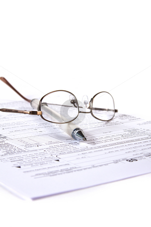To use this stock image in your creative project, please select the size you need over to the right and click the "Add to Cart" button.
Your downloaded image will come with the Cutcaster watermark removed so don’t worry about the watermark you see on this page. Preparing Taxes stock photo, Preparing Taxes - Form 1040 for 2008 by Mehmet Dilsiz