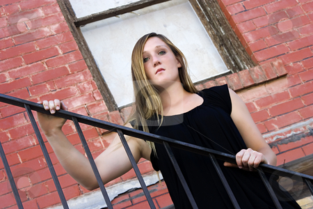 To use this stock image in your creative project, please select the size you need over to the right and click the "Add to Cart" button.
Your downloaded image will come with the Cutcaster watermark removed so don’t worry about the watermark you see on this page. Beautiful Girl posing outdoors on stairs in the City stock photo, Beautiful Girl in Black dress posing outdoors in the City - Urban by Mehmet Dilsiz