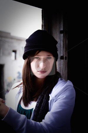 To use this stock image in your creative project, please select the size you need over to the right and click the "Add to Cart" button.
Your downloaded image will come with the Cutcaster watermark removed so don’t worry about the watermark you see on this page. Beautiful Teenager with a Hat stock photo, Close up on a Beautiful Teenager Sitting on an Old Abandoned Train by Mehmet Dilsiz