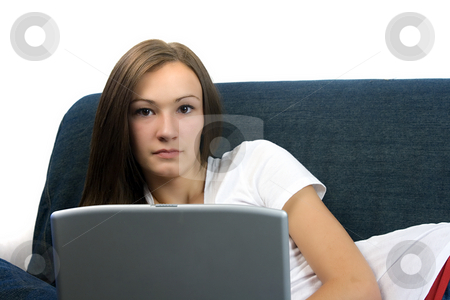 To use this stock image in your creative project, please select the size you need over to the right and click the "Add to Cart" button.
Your downloaded image will come with the Cutcaster watermark removed so don’t worry about the watermark you see on this page. Teenager with a Laptop stock photo, Teenager with a Laptop Looking at the Computer by Mehmet Dilsiz