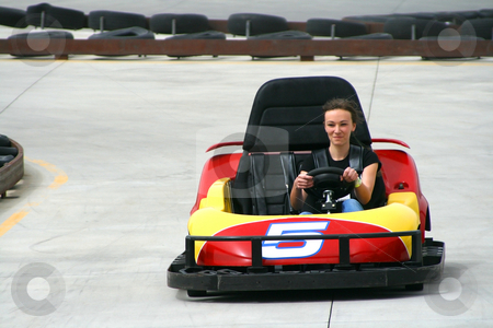 To use this stock image in your creative project, please select the size you need over to the right and click the "Add to Cart" button.
Your downloaded image will come with the Cutcaster watermark removed so don’t worry about the watermark you see on this page. Teenager on the Go Cart stock photo, Teenager racing on the Go Cart by Mehmet Dilsiz
