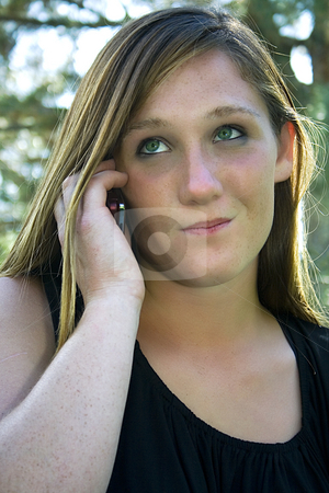 To use this stock image in your creative project, please select the size you need over to the right and click the "Add to Cart" button.
Your downloaded image will come with the Cutcaster watermark removed so don’t worry about the watermark you see on this page. Beautiful Girl in the Park in a Black Dress Talking on the Phone stock photo, Close up on a Beautiful in a Black Dress Talking on a Cell Phone by Mehmet Dilsiz