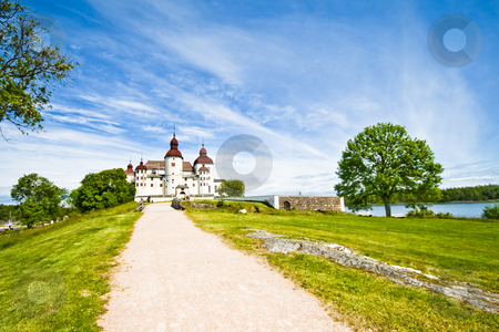 To use this stock image in your creative project, please select the size you need over to the right and click the "Add to Cart" button.
Your downloaded image will come with the Cutcaster watermark removed so don’t worry about the watermark you see on this page. Old castle stock photo, Old swedish castle in white lime by Fredrik Elfdahl