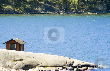 To use this stock image in your creative project, please select the size you need over to the right and click the "Add to Cart" button.
Your downloaded image will come with the Cutcaster watermark removed so don’t worry about the watermark you see on this page. Cabin stock photo, Small cabin by the sea by Fredrik Elfdahl