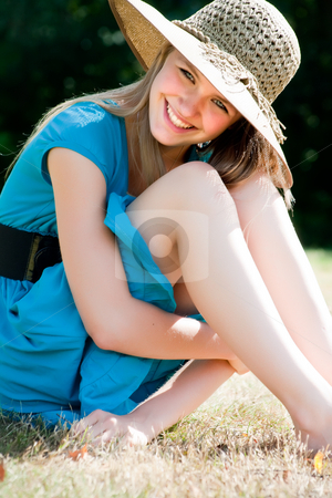 To use this stock image in your creative project, please select the size you need over to the right and click the "Add to Cart" button.
Your downloaded image will come with the Cutcaster watermark removed so don’t worry about the watermark you see on this page. Happy lifestyle girl stock photo, Teenage girl in fresh and happy mood outside in the park by Frenk and Danielle Kaufmann