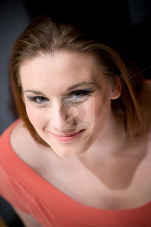 To use this stock image in your creative project, please select the size you need over to the right and click the "Add to Cart" button.
Your downloaded image will come with the Cutcaster watermark removed so don’t worry about the watermark you see on this page. Smiling Young Woman stock photo, Portrait of a young woman with a natural smile. by Todd Arena