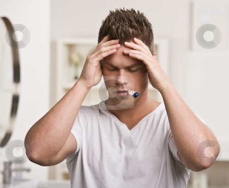 To use this stock image in your creative project, please select the size you need over to the right and click the "Add to Cart" button.
Your downloaded image will come with the Cutcaster watermark removed so don’t worry about the watermark you see on this page. Man Taking His Temperature stock photo, A man is standing in a bathroom with a thermometer in his mouth. He has his hands on his head and his eyes are closed. Square framed shot. by Jonathan Ross