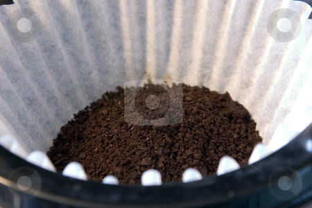 To use this stock image in your creative project, please select the size you need over to the right and click the "Add to Cart" button.
Your downloaded image will come with the Cutcaster watermark removed so don’t worry about the watermark you see on this page. Getting Ready to Make Coffee - Grounded Coffee in the Filter stock photo, Close up on a Coffee Filter in the Coffee Machine by Mehmet Dilsiz
