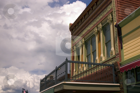 To use this stock image in your creative project, please select the size you need over to the right and click the "Add to Cart" button.
Your downloaded image will come with the Cutcaster watermark removed so don’t worry about the watermark you see on this page. Close up on an Old Building with Cloudy Background stock photo, Old Colonial Building by Mehmet Dilsiz