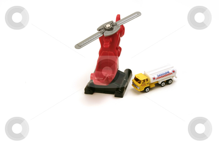 To use this stock image in your creative project, please select the size you need over to the right and click the "Add to Cart" button.
Your downloaded image will come with the Cutcaster watermark removed so don’t worry about the watermark you see on this page. Isolated Chopper & Gas Tanker stock photo, Isolated Helicopter & the Gas Tanker by Mehmet Dilsiz