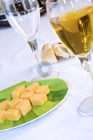 To use this stock image in your creative project, please select the size you need over to the right and click the "Add to Cart" button.
Your downloaded image will come with the Cutcaster watermark removed so don’t worry about the watermark you see on this page. Close up on a plate of cheese with Wine Glasses stock photo, Angle Shot of a plate of cheese with Wine Glasses by Mehmet Dilsiz