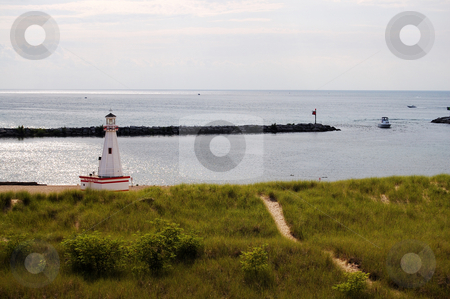 To use this stock image in your creative project, please select the size you need over to the right and click the "Add to Cart" button.
Your downloaded image will come with the Cutcaster watermark removed so don’t worry about the watermark you see on this page. Lake Michigan New Buffalo stock photo, by Heather Shelley
