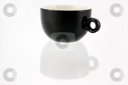 To use this stock image in your creative project, please select the size you need over to the right and click the "Add to Cart" button.
Your downloaded image will come with the Cutcaster watermark removed so don’t worry about the watermark you see on this page. Essential cup of coffee stock photo, Essential photo of an empty black and white cup for coffee with shadow reflection by Roberto Marinello