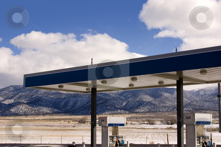 To use this stock image in your creative project, please select the size you need over to the right and click the "Add to Cart" button.
Your downloaded image will come with the Cutcaster watermark removed so don’t worry about the watermark you see on this page. Gas Station and Cloudy Skies stock photo, Gas Station with fields and Mountains on the background by Mehmet Dilsiz
