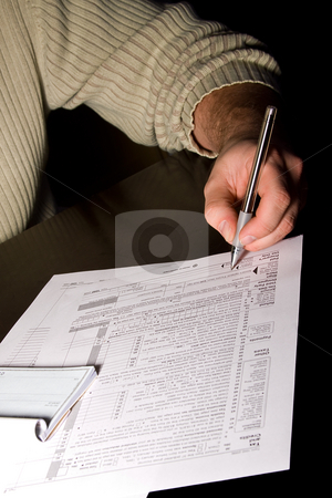To use this stock image in your creative project, please select the size you need over to the right and click the "Add to Cart" button.
Your downloaded image will come with the Cutcaster watermark removed so don’t worry about the watermark you see on this page. Signing the Tax Forms stock photo, A man signing 1040 tax forms by Mehmet Dilsiz