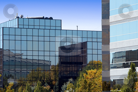 To use this stock image in your creative project, please select the size you need over to the right and click the "Add to Cart" button.
Your downloaded image will come with the Cutcaster watermark removed so don’t worry about the watermark you see on this page. Mirrored Business Buildings stock photo, Sky reflecting from the Mirrored Business Building by Mehmet Dilsiz