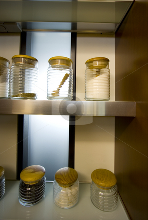 To use this stock image in your creative project, please select the size you need over to the right and click the "Add to Cart" button.
Your downloaded image will come with the Cutcaster watermark removed so don’t worry about the watermark you see on this page. Containers on the Shelf stock photo, Modern Containers with While Glass background by Mehmet Dilsiz