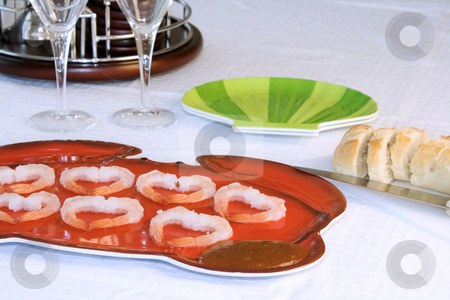 To use this stock image in your creative project, please select the size you need over to the right and click the "Add to Cart" button.
Your downloaded image will come with the Cutcaster watermark removed so don’t worry about the watermark you see on this page. Shrimp Plate with Sliced Bread and Cocktail Set stock photo, Close up on a Table with Shrimp Plate with Sliced Bread and Cocktail Set by Mehmet Dilsiz