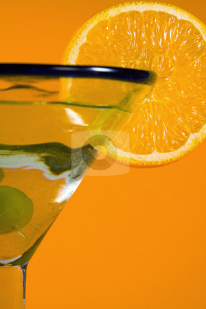 To use this stock image in your creative project, please select the size you need over to the right and click the "Add to Cart" button.
Your downloaded image will come with the Cutcaster watermark removed so don’t worry about the watermark you see on this page. Martini Glass stock photo, Martini Glass - Isolated on Orange Background by Mehmet Dilsiz