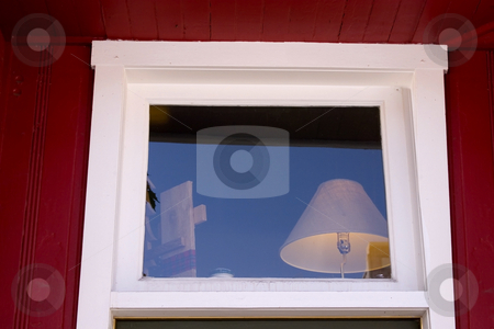 To use this stock image in your creative project, please select the size you need over to the right and click the "Add to Cart" button.
Your downloaded image will come with the Cutcaster watermark removed so don’t worry about the watermark you see on this page. Close up on a Window with Lamp inside stock photo, Lamp Shade Behind the Window with Reflections by Mehmet Dilsiz