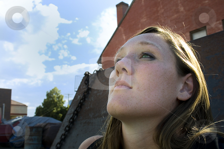 To use this stock image in your creative project, please select the size you need over to the right and click the "Add to Cart" button.
Your downloaded image will come with the Cutcaster watermark removed so don’t worry about the watermark you see on this page. Close up on a Girl Looking Up - Urban stock photo, Close up on a Girl Looking Up in an Alley- Urban by Mehmet Dilsiz