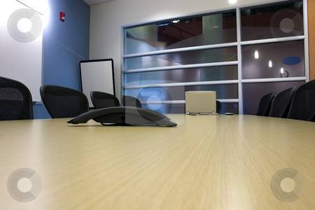 To use this stock image in your creative project, please select the size you need over to the right and click the "Add to Cart" button.
Your downloaded image will come with the Cutcaster watermark removed so don’t worry about the watermark you see on this page. Conference Room with a Laptop and a PDA on the table stock photo, Conference Room with a Laptop, PDA, phone on the table, and the empty chairs by Mehmet Dilsiz