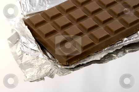 To use this stock image in your creative project, please select the size you need over to the right and click the "Add to Cart" button.
Your downloaded image will come with the Cutcaster watermark removed so don’t worry about the watermark you see on this page. Isolated Chocolate Bar stock photo, Isolated Chocolate Bar on a Mirror inside the Wrapper by Mehmet Dilsiz