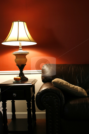To use this stock image in your creative project, please select the size you need over to the right and click the "Add to Cart" button.
Your downloaded image will come with the Cutcaster watermark removed so don’t worry about the watermark you see on this page. Lamp and the Couch - Vertical Shot stock photo, Close up on a Lamp and the Coush in a House by Mehmet Dilsiz