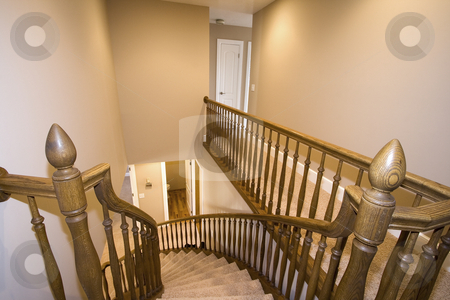 To use this stock image in your creative project, please select the size you need over to the right and click the "Add to Cart" button.
Your downloaded image will come with the Cutcaster watermark removed so don’t worry about the watermark you see on this page. Staircase in a House stock photo, Looking down from a staircase in a house by Mehmet Dilsiz