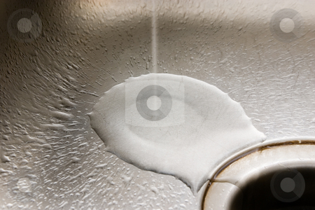 To use this stock image in your creative project, please select the size you need over to the right and click the "Add to Cart" button.
Your downloaded image will come with the Cutcaster watermark removed so don’t worry about the watermark you see on this page. Running Water in the Sink stock photo, by Mehmet Dilsiz
