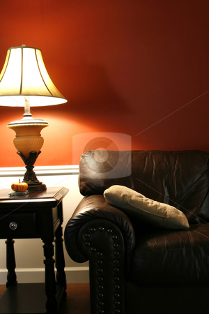 To use this stock image in your creative project, please select the size you need over to the right and click the "Add to Cart" button.
Your downloaded image will come with the Cutcaster watermark removed so don’t worry about the watermark you see on this page. Lamp and the Couch - Vertical Shot stock photo, Close up on a Lamp and the Coush in a House by Mehmet Dilsiz