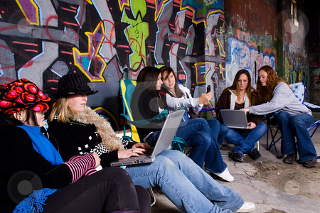 To use this stock image in your creative project, please select the size you need over to the right and click the "Add to Cart" button.
Your downloaded image will come with the Cutcaster watermark removed so don’t worry about the watermark you see on this page. Teeangers on their laptops stock photo, Teenagers working on their laptops with grunge background by Mehmet Dilsiz