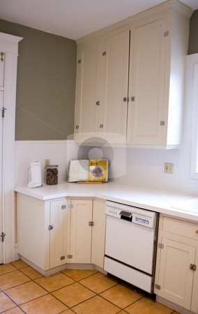 To use this stock image in your creative project, please select the size you need over to the right and click the "Add to Cart" button.
Your downloaded image will come with the Cutcaster watermark removed so don’t worry about the watermark you see on this page. Kitchen stock photo, Close up on a Kitchen in a Nice House by Mehmet Dilsiz